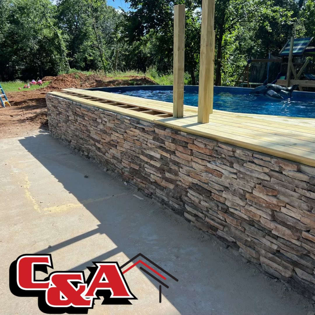 Stone wall and pool deck built by C&A in Claremore