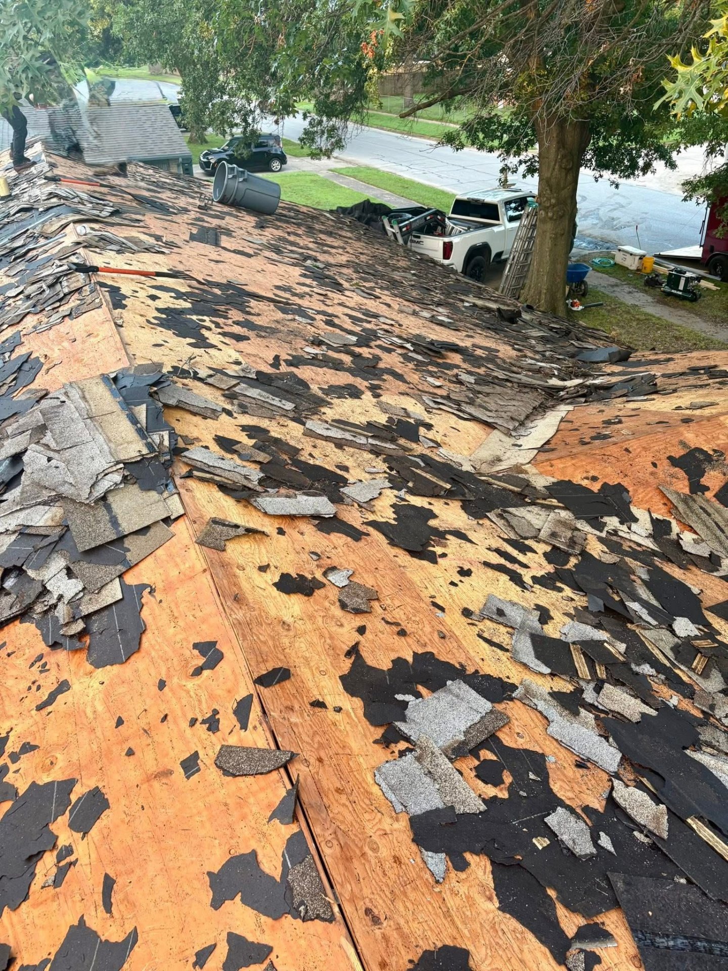 Roof tear-off exposing decking during replacement