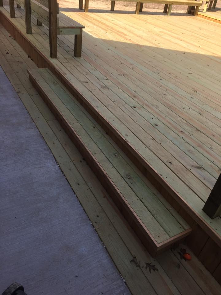 Deck bench construction showing professional framing and support structure