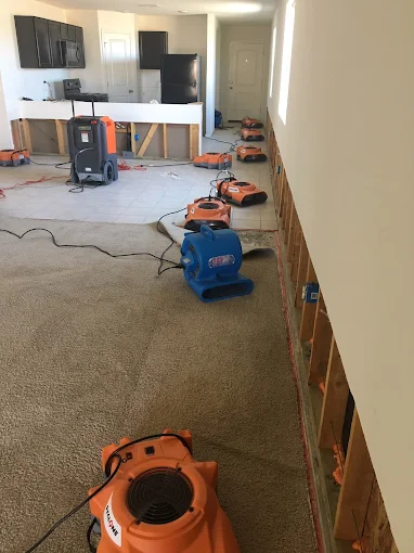 Professional water drying equipment and air movers deployed for water damage restoration in Oklahoma