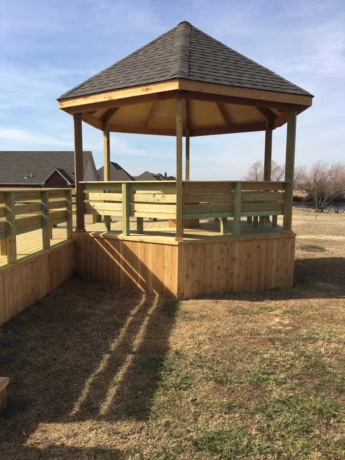 Completed gazebo with professional roofing and structural support