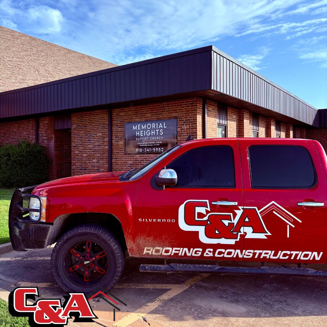 C&A Roofing & Construction truck on site for commercial roofing project