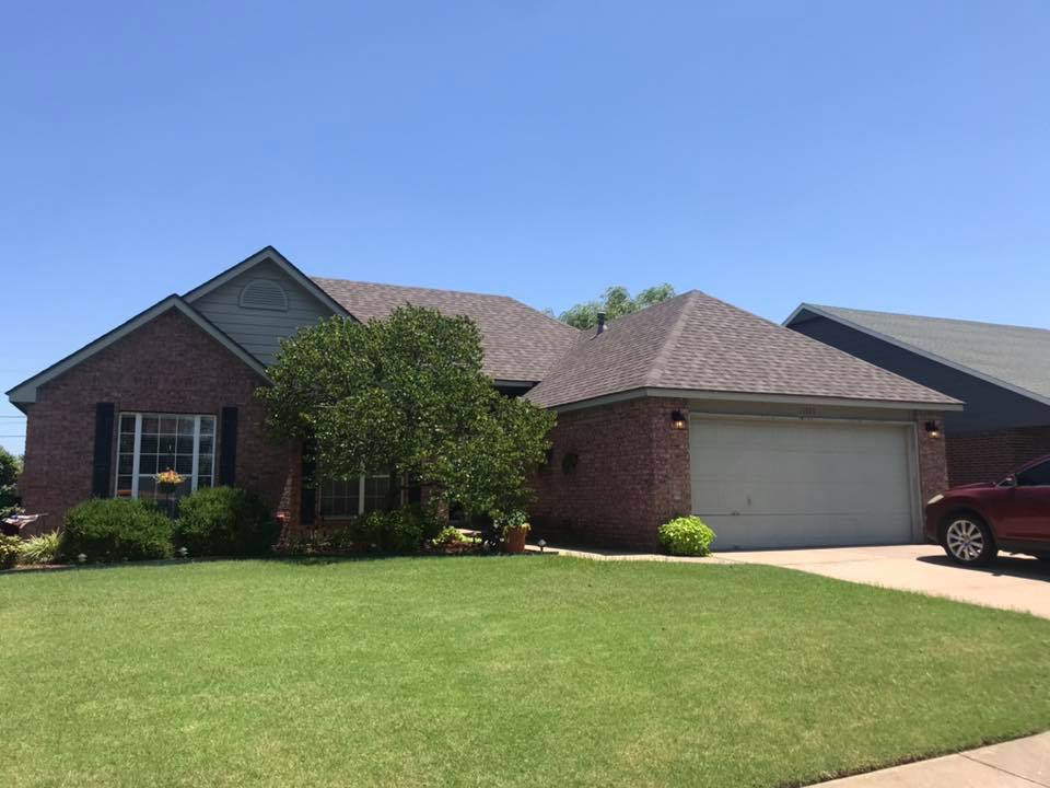 Beautiful residential home showcasing completed professional roofing work