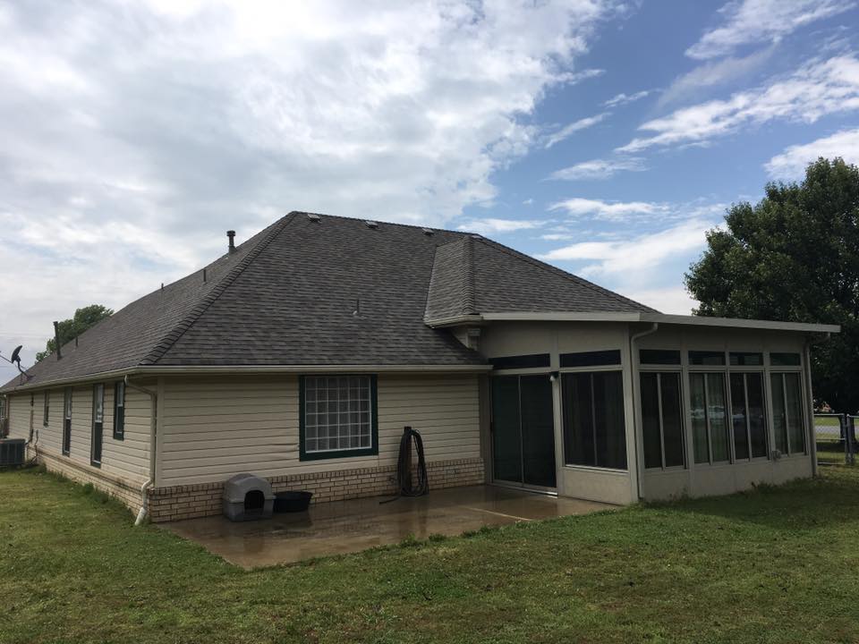 Home addition featuring sunroom extension on Oklahoma home