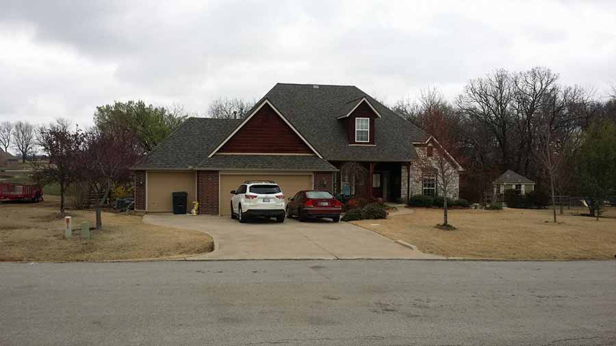 Modern residential home in Oklahoma featuring energy-efficient windows and professional exterior construction